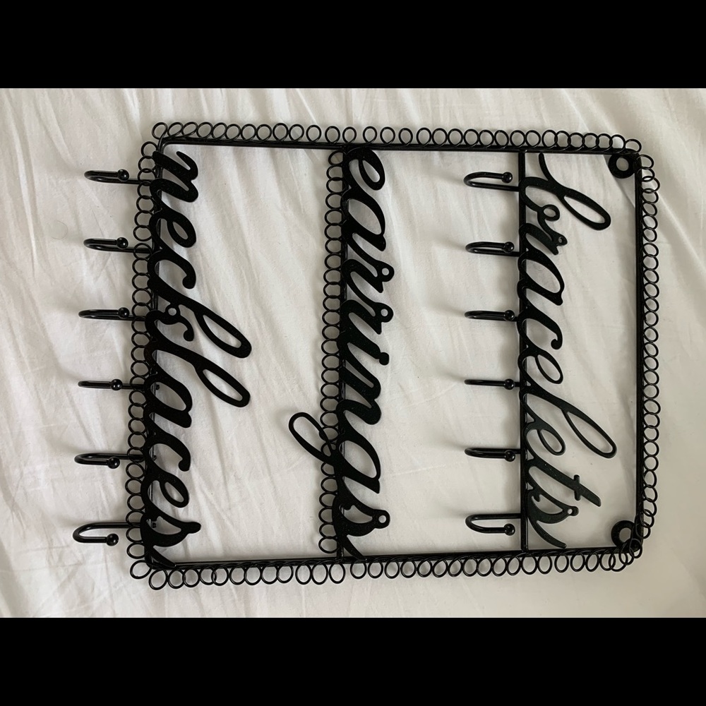 Jewelry holder for wall with hooks